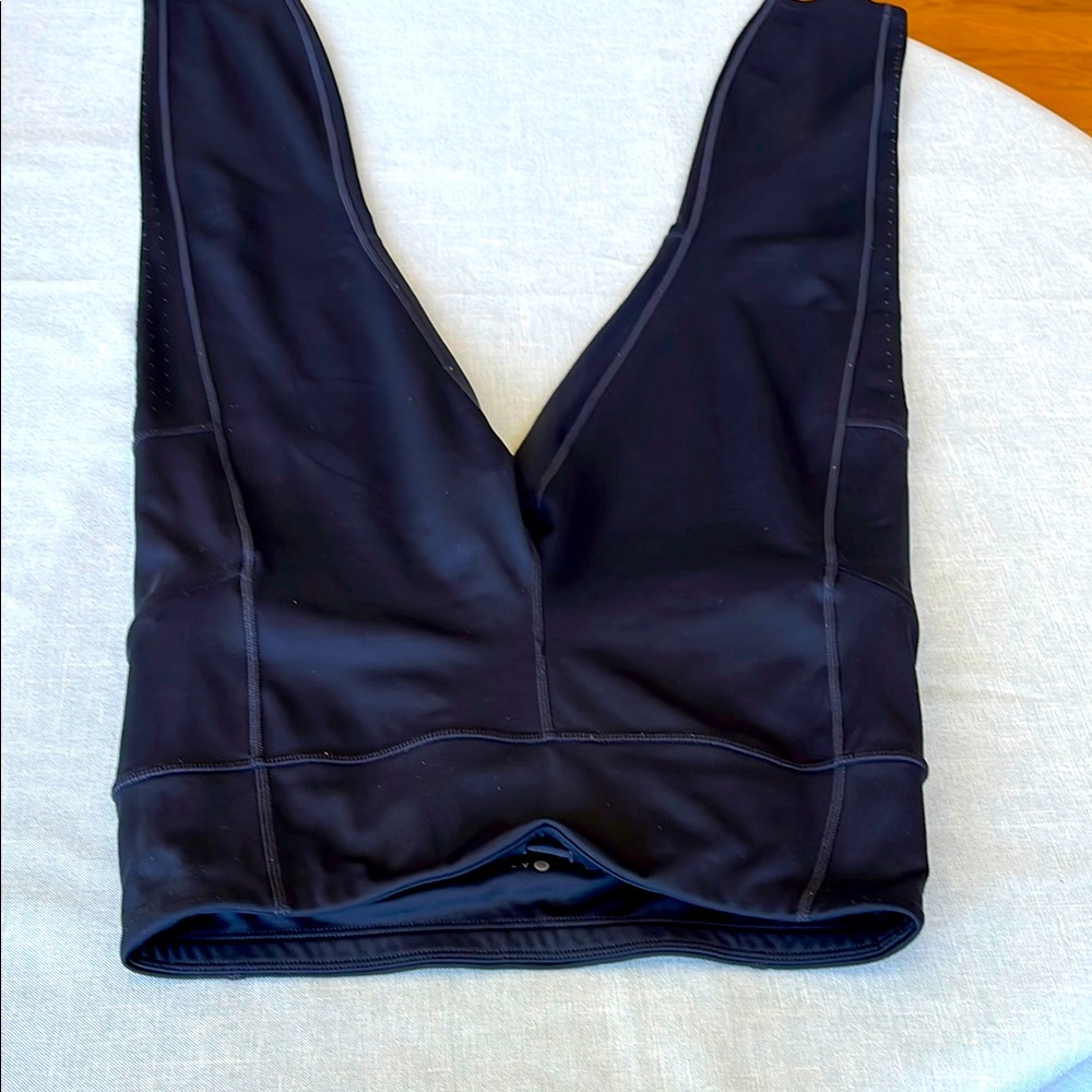 Athleta black size s side vented leggings with zipper pockets. NWOT. 7/8 length.